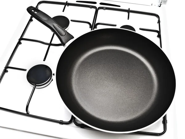 Frying pan at gas stove — Stock Photo, Image