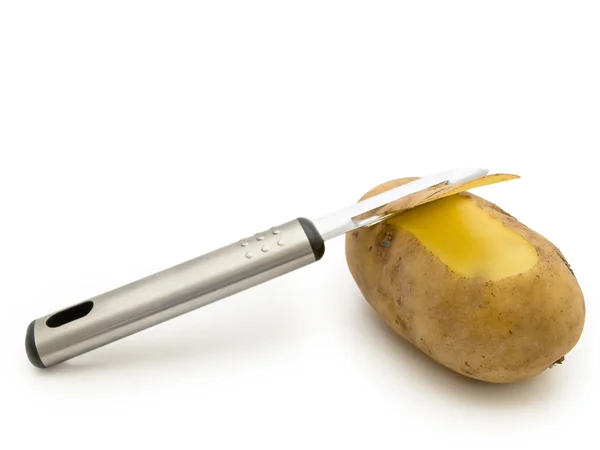 Potatoes with knife — Stock Photo, Image