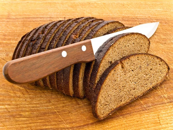 Brot und Messer — Stockfoto