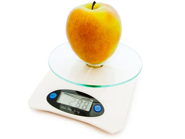 Apple na váhy — Stock fotografie