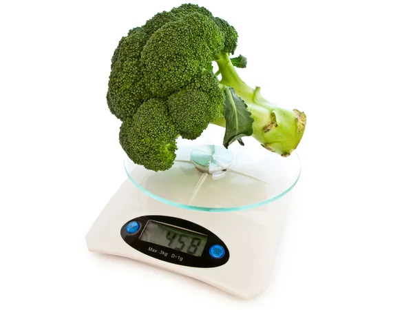 Broccoli at scales — Stock Photo, Image