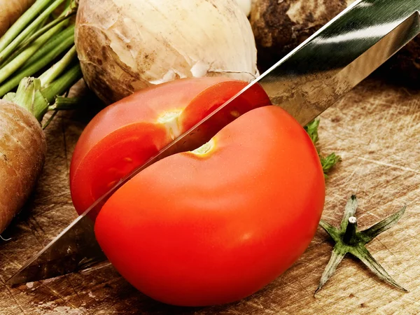 Snijden tomaat — Stockfoto