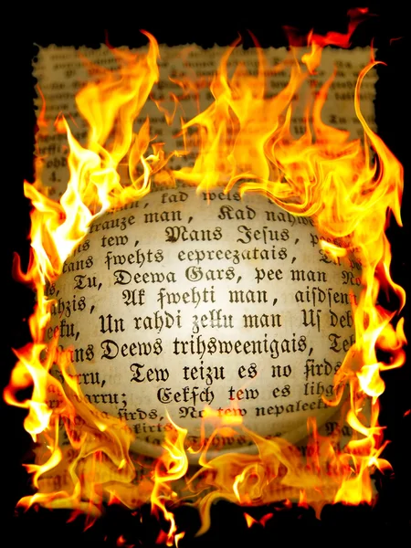 Old text in flame — Stock Photo, Image