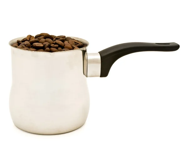 Türkische Kaffeemaschine mit Kaffeebohnen — Stockfoto