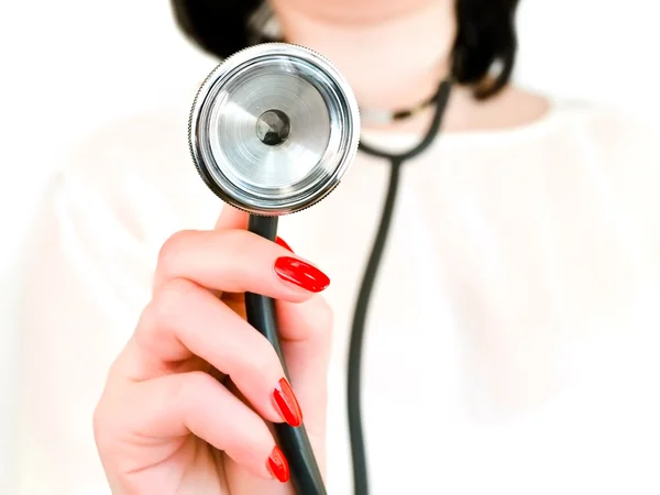 Hand av sjuksköterskor med stetoskop — Stockfoto
