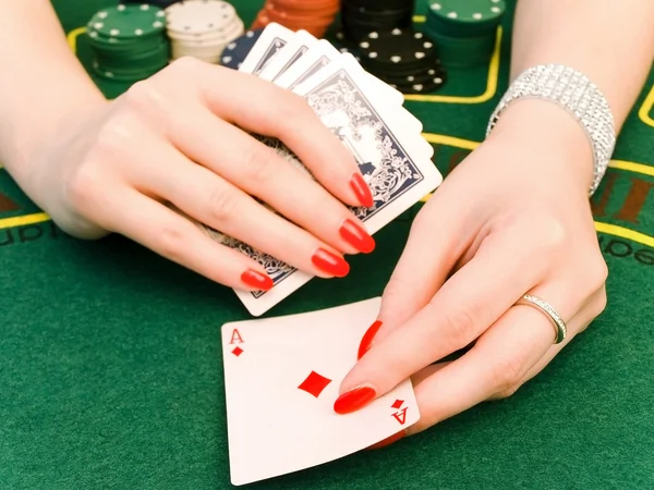 Woman playing in casino — Stock Photo, Image
