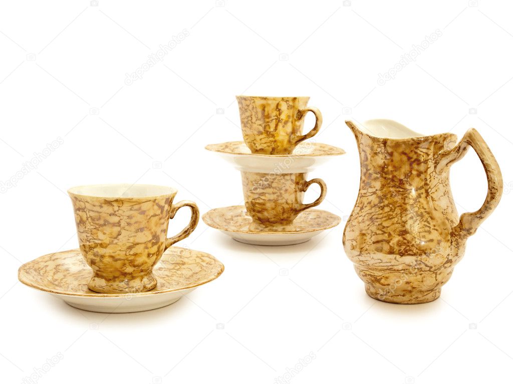 Coffee cups and cream jug