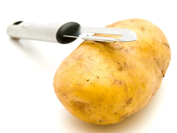 Potato with knife — Stock Photo, Image