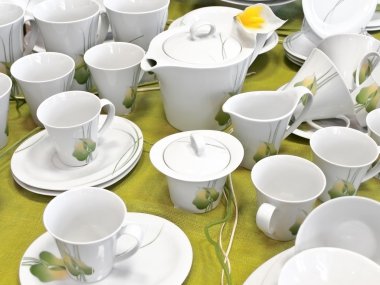 Tea service at green clipart