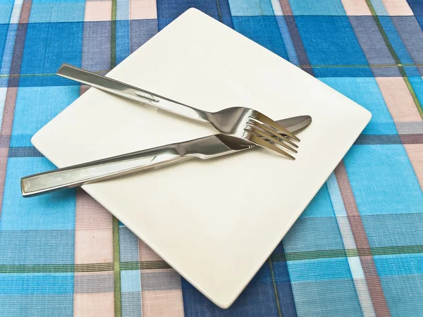 Prato na toalha de mesa — Fotografia de Stock