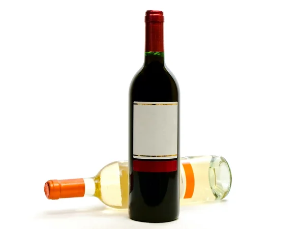 Röda och vita vinflaskor — Stockfoto
