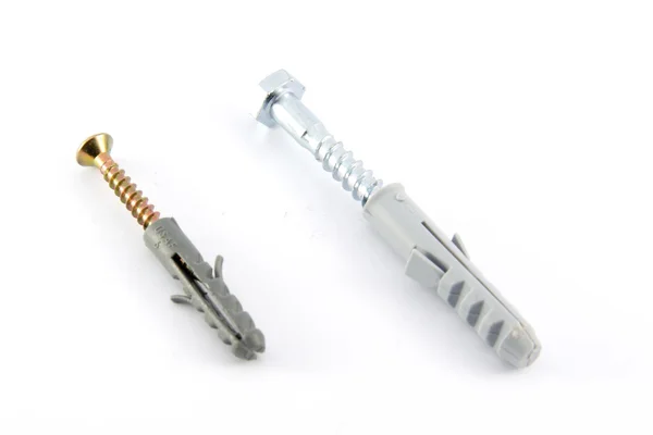 Screws with plastic dowels — Stock Photo, Image