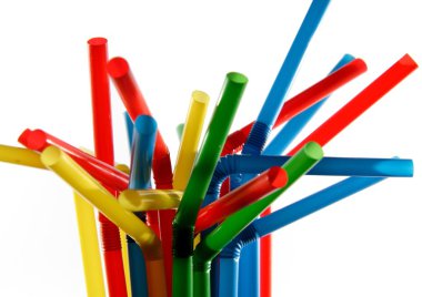 Colorful straws in a cup clipart