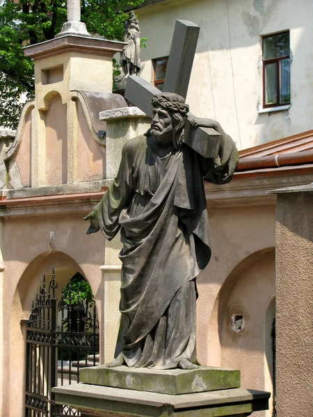 Jesus Christ statue with cross — Stock Photo, Image