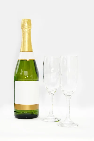 Bottle of champagne and glasses — Stock Photo, Image