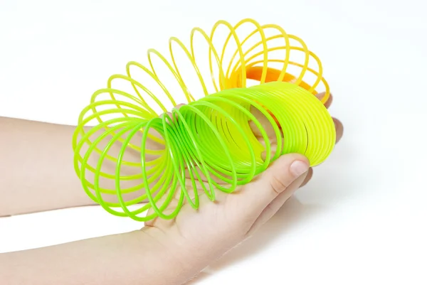 stock image Spring toy in the hands of a child