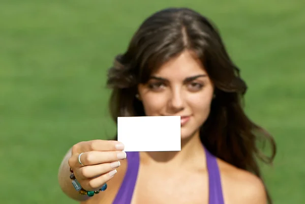stock image Beautiful girl with business card