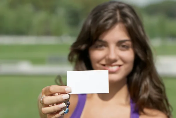 Beautiful girl with business card — Stock Photo, Image