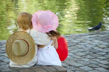 Boy and girl in park clipart