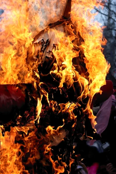 Uma efígie em chamas. Semana da panqueca Imagens Royalty-Free