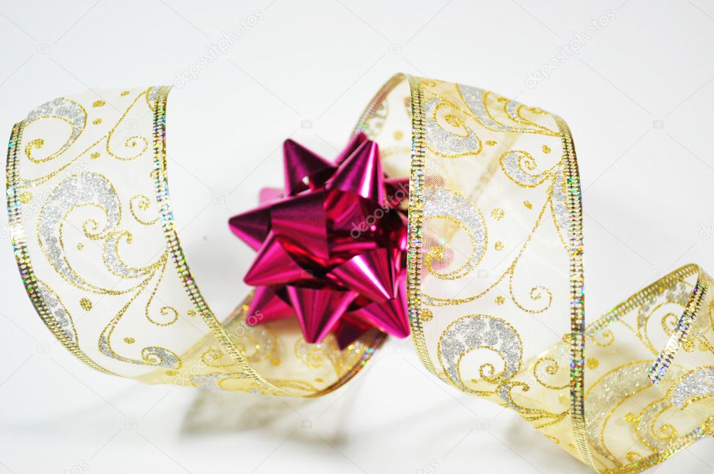 Golden ribbon with christmas decor