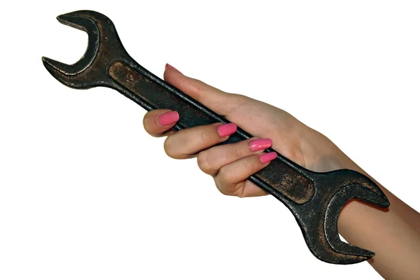 Old wrench in female hand — Stock Photo, Image