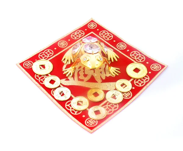Восточный сувенир: золотая лягушка защищает монеты — стоковое фото