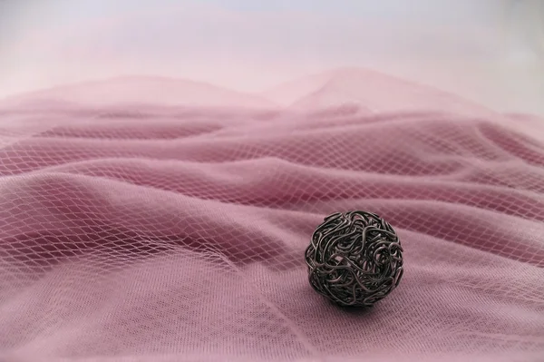 Natura morta con jersey rosa e filo — Foto Stock