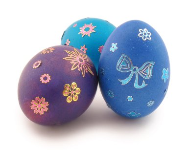 Blue,turquoise, violet eggs with ornamet clipart