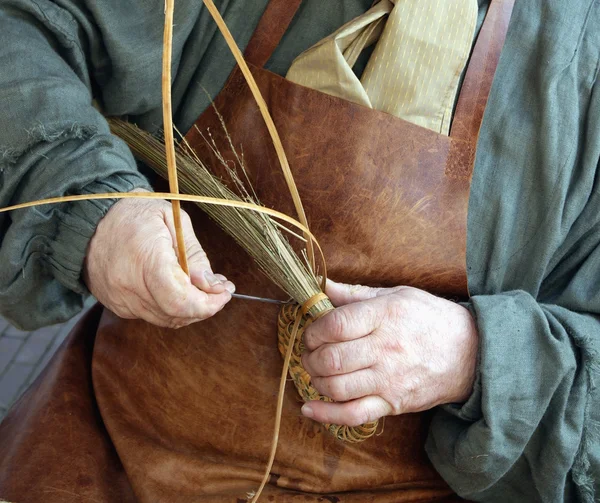 stock image Craftsman making a basket out of weed