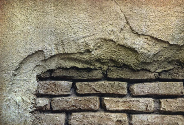 Popraskané stará cihlová zeď — Stock fotografie