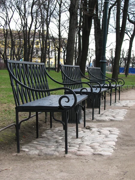 stock image Three empty benches