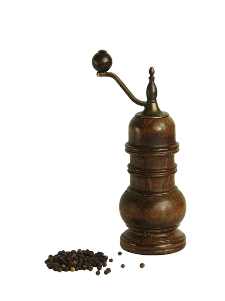 stock image Pepper mill and handful of black pepper