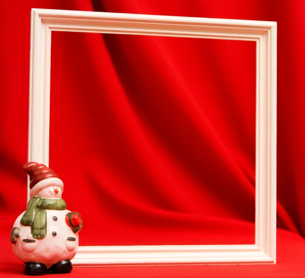 Houten frame op rood — Stockfoto