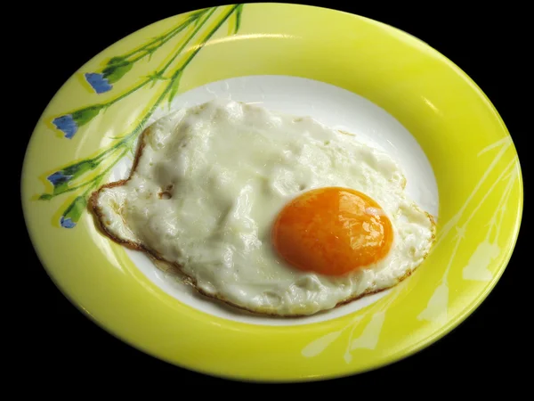 Plaka üzerinde sahanda yumurta — Stok fotoğraf