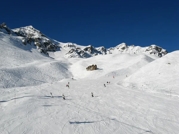 Skiing in swiss alps Stock Image