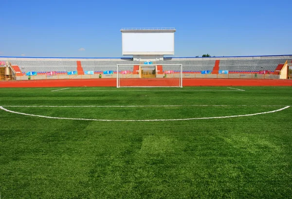 Ποδόσφαιρο, ποδόσφαιρο stadium πράσινο πεδίο με στόχο. — Φωτογραφία Αρχείου