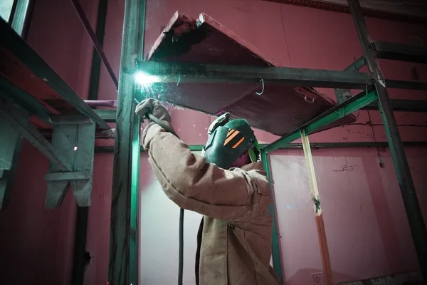 Welder work with metal construction — Stock Photo, Image