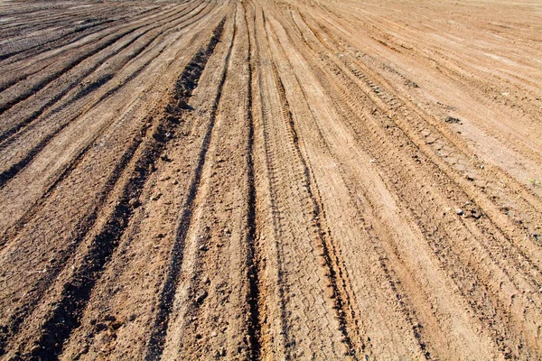 Struttura del terreno con tracce della ruota — Foto Stock
