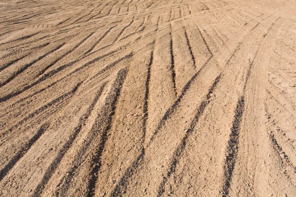 Textura del suelo con rastros de la rueda — Foto de Stock
