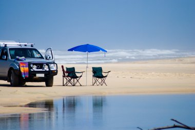 Car on the beach clipart