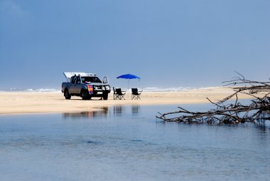 Beach scenery on Fraser Island with 4WD clipart