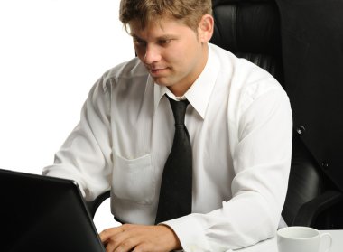 The young businessman on a workplace clipart