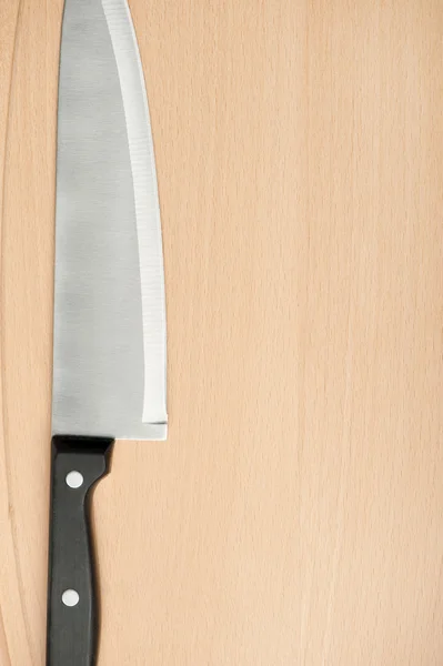 Knife and board for cutting food — Stock Photo, Image