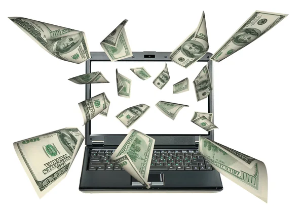 Laptop e dólares — Fotografia de Stock