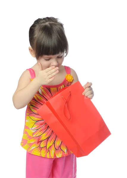The little girl with surprise package — Stock Photo, Image