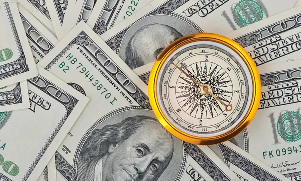 Dolarów i kompas — Zdjęcie stockowe