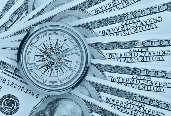 Dollar und Kompass — Stockfoto
