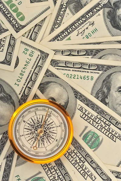 Dollar och kompass — Stockfoto