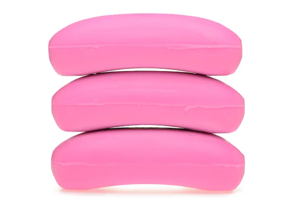 Três sabonetes de cor rosa — Fotografia de Stock